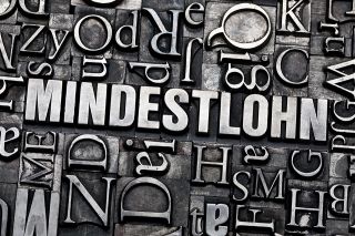 © Goss Vitalij - stock.adobe.com Foto: Schriftzug Mindestlohn